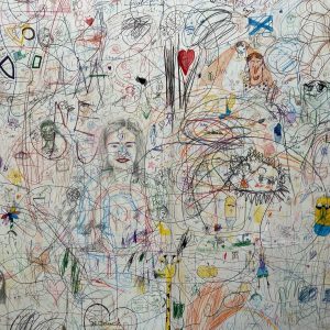 woman in blue dress and man in blue shirt graffiti